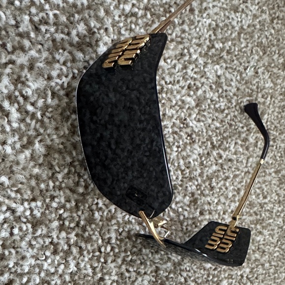 Miu Miu Black and Gold Sunglasses